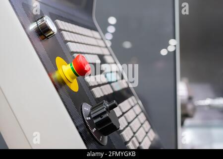 Control panel of cnc turning milling lathe machine at factory - close up Stock Photo