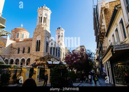 Beautiful day scene with pedestrians and Agia Paraskevi Church Stock Photo