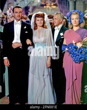 COVER GIRL 1944 Columbia Pictures film with from left: Lee Bowman, Rita Hayworth, Otto Kruger, Eve Arden. Stock Photo