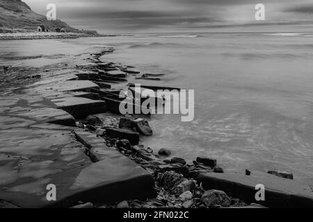 Kimmeridge Bay fossil hunting, Dorset, UK Stock Photo