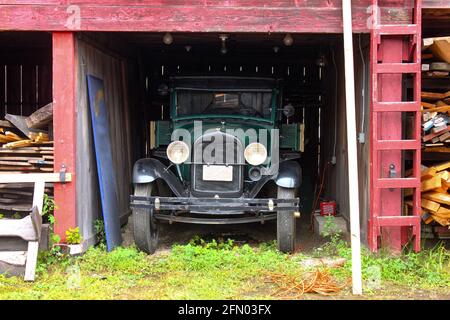 Antique truck parked in old lumber yard Mystic Connecticut USA circa May 2011 Stock Photo