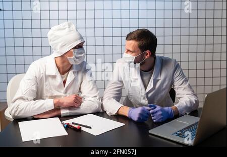 Doctor, Computer, Healthcare And Medicine. Two doctors working together in the office Stock Photo