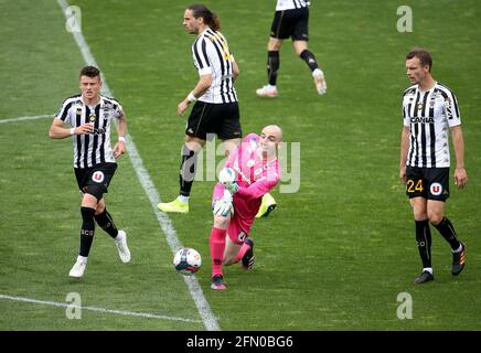 Goalkeeper of Angers Paul Bernardoni surrounded by Pierrick Capelle, Mateo Pavlovic, Romain Thomas of Angers during the French championship Ligue 1 football match between Angers SCO and Dijon FCO (DFCO) on May 9, 2021 at Stade Raymond Kopa in Angers, France - Photo Jean Catuffe / DPPI Stock Photo