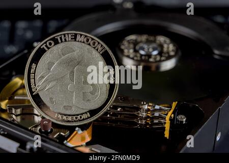 Coin Dogecoin on a cryptocurrency mining for computer Hard disk drives SSD Stock Photo