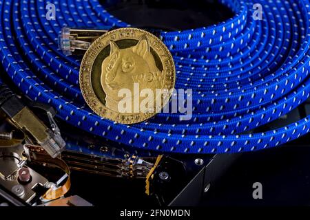 New cryptocurrency Dogecoin on a mining a virtual currency for using computer hard disk drives Stock Photo