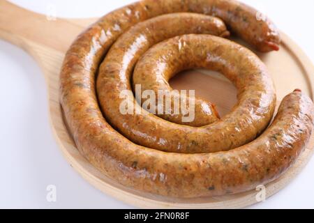 Local Northern Thai food , Northern Thai spicy sausage street food isolated in white background Stock Photo