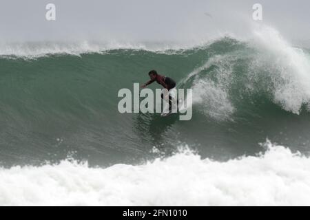 World Junior Surfing Champion Lukas Skinner on a perfect wave Stock Photo