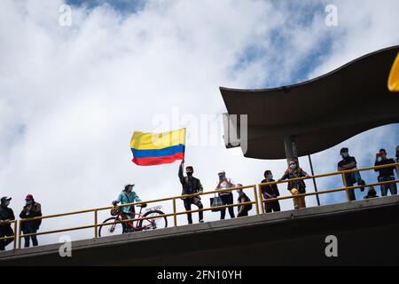 Bogota, Cundinamarca, Colombia. 12th May, 2021. The city of Bogota faces its fourteenth day of protests in the context of the national strike called by social sectors against the Colombian government of President Ivan Duque Credit: Daniel Romero/LongVisual/ZUMA Wire/Alamy Live News Stock Photo