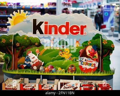 Kinder Surprise in Ukranian store. Kinder Surprise, also known as Kinder Egg or Kinder Surprise Egg, is a candy manufactured by the Italian company Ferrero SpA since 1974. Stock Photo