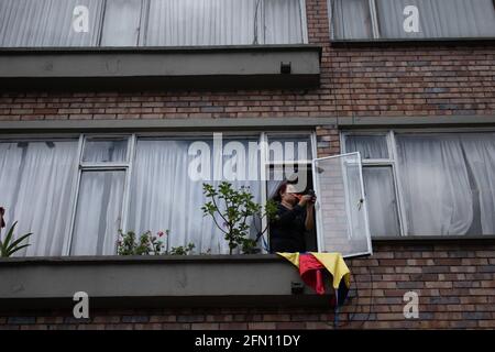 Bogota, Cundinamarca, Colombia. 12th May, 2021. The city of Bogota faces its fourteenth day of protests in the context of the national strike called by social sectors against the Colombian government of President Ivan Duque Credit: Daniel Romero/LongVisual/ZUMA Wire/Alamy Live News Stock Photo