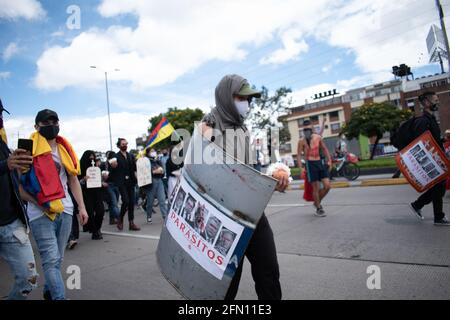 Bogota, Cundinamarca, Colombia. 12th May, 2021. The city of Bogota faces its fourteenth day of protests in the context of the national strike called by social sectors against the Colombian government of President Ivan Duque Credit: Daniel Romero/LongVisual/ZUMA Wire/Alamy Live News Stock Photo