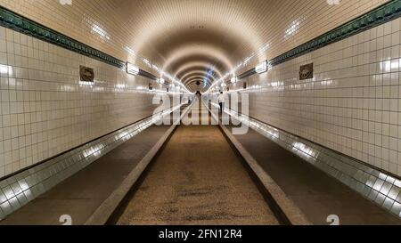 The St. Pauli Elbe Tunnel s a pedestrian and vehicle tunnel .Connect central Hamburg with the docks and shipyards on the south side of the Stock Photo