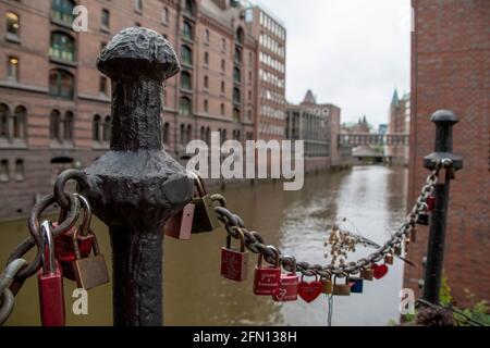Locks on a bridge in Hamburg for lovers and strong relationships. Stock Photo