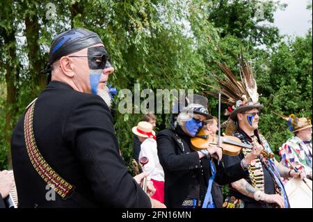 Leicester based group, Bakanalian Border Morris, performing in nearby Market Harborough, UK Stock Photo