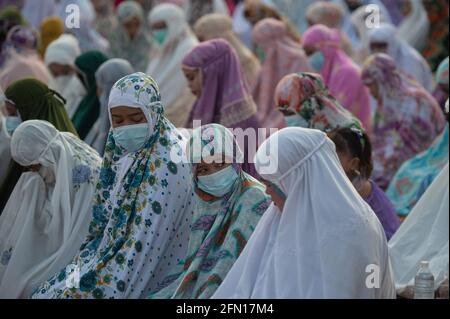 Azhar Mask Jakarta, Indonesia. 13th May, 2021. A girl wearing a face mask is seen ...