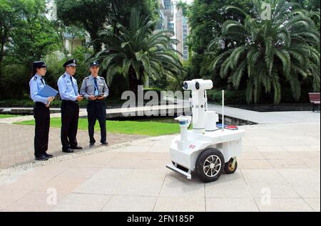 Taizhou, China. 12th May, 2021. A 5G patrol robot is working in a residential area in Taizhou, Zhejiang, China on 12th May, 2021.(Photo by TPG/cnsphotos) Credit: TopPhoto/Alamy Live News Stock Photo