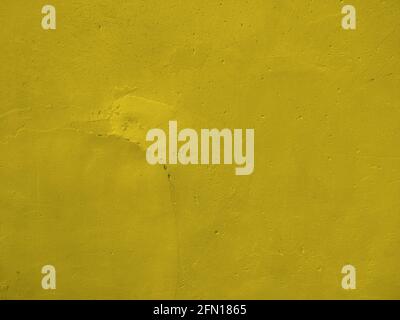 Wall yellow textured rusty background. concrete stucco backdrop. Stock Photo