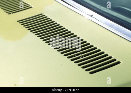 air intake grille on the body of a retro car Stock Photo