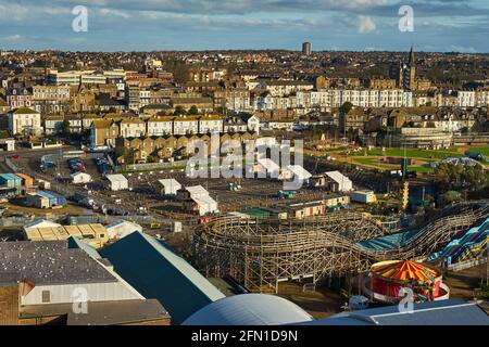 Margate, United Kingdom - February 5, 2021: View from Arlington House in Margate towards Cliftonville, with a Covid 19 testing centre behind Dreamland Stock Photo