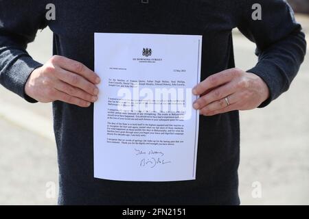 The letter sent from Prime Minister Boris Johnson to the families of among killed in the series of shootings in Ballymurphy, Belfast, between August 9-11, 1971. Picture date: Thursday May 13, 2021. The Government is 'truly sorry' for the events in Ballymurphy 50 years ago, in which 10 innocent people were killed, the Secretary of State for Northern Ireland, Brandon Lewis, has said. See PA story ULSTER Ballymurphy. Photo credit should read: Brian Lawless/PA Wire