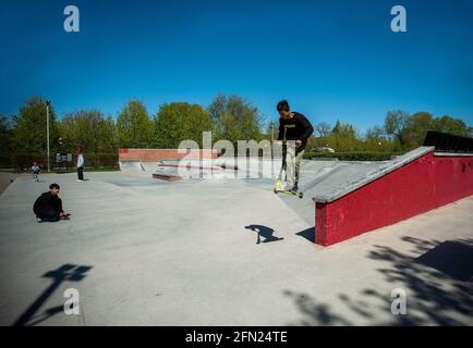 05-10-2021  Scooter   for jumping  in Gorky park . Boy blurred from motion Stock Photo