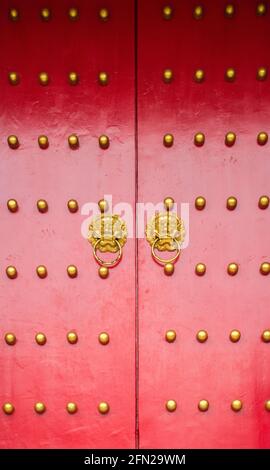 Ancient red door closed Stock Photo