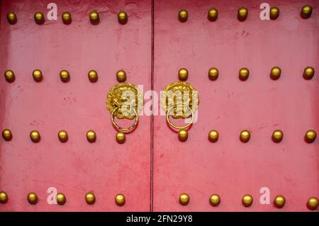 Ancient red door closed Stock Photo