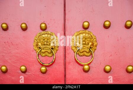 Ancient red door closed Stock Photo