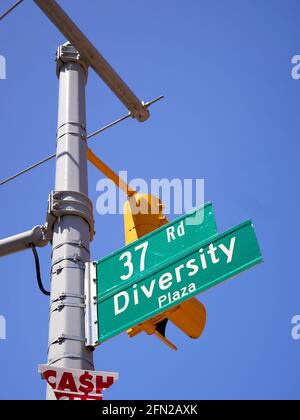 Diversity Plaza street sign, Jackson Heights, Queens, New York, USA Stock Photo