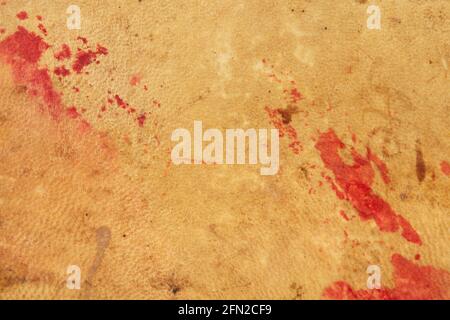 Old parchment leather with red sealing wax stains, texture background Stock Photo