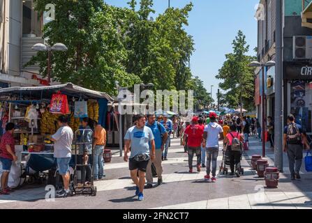 Sales booth and strollers in a pedestrian street in Santiago, Chile Stock Photo