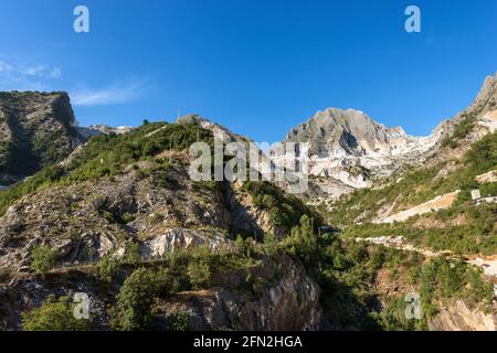 Landscape view of the famous white Carrara marble quarries on the Apuan Alps. Massa and Carrara province, Tuscany, Italy, Europe. Stock Photo