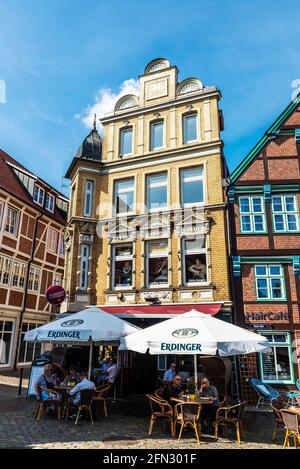 Hansestadt Stade, Germany - August 22, 2019: Terrace of a bar with people drinking in Hansestadt Stade, Lower Saxony, Germany Stock Photo