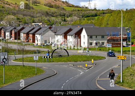 Merthyr Vale, Wales - May 2021: Entrance to a new housing development near Merthyr Tydfil. The houses are built on the site of an old colliery. Stock Photo