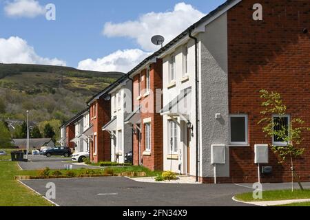 Merthyr Vale, Wales - May 2021: New detached homes on a housing development near Merthyr Tydfil. The houses are built on the site of an old colliery. Stock Photo