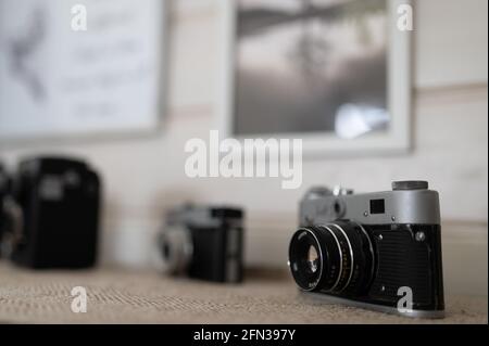Retro vintage cameras on shelf Stock Photo