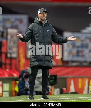 Manchester, UK. 14th May, 2021. Liverpool's manager Jurgen Klopp reacts during the Premier League match between Manchester United and Liverpool at Old Trafford in Manchester, Britain, on May 13, 2021. Credit: Xinhua/Alamy Live News Stock Photo