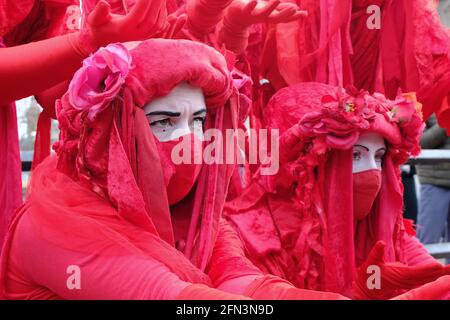 The Rebel Red Brigade appear during a Kill the Bill protest. The performance troupe was created to highlight the global environmental crisis Stock Photo