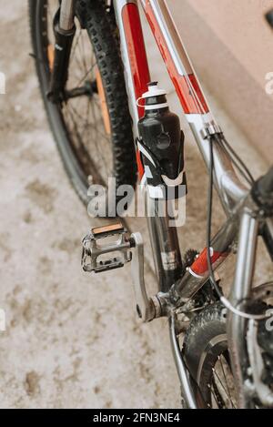 dirty bicycle with water bottle Stock Photo