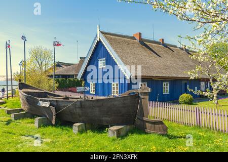 Ethnographic fisherman's museum. Beautiful old Lithuanian traditional wooden blue house of the Curonian Spit in Nida fishermen's village, Lithuania Stock Photo