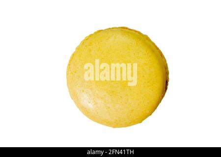 Lemon flavor homemade yellow macaron isolated on a white background, top view. Stock Photo