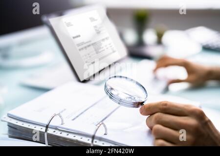 Accountant Calculating E Invoice Tax Bill And Receipt Stock Photo
