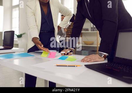 Team of creative businesspeople brainstorming as they start working on new project Stock Photo