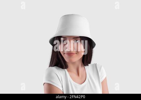 Mockup of a white panama on a pretty girl, close-up, front view, isolated on background. Summer universal sun protection accessory template. Textured Stock Photo