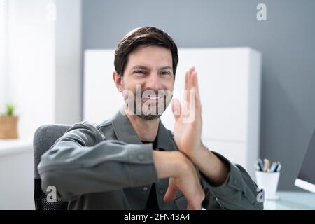 Adult Learning Sign Language For Deaf Disabled Stock Photo