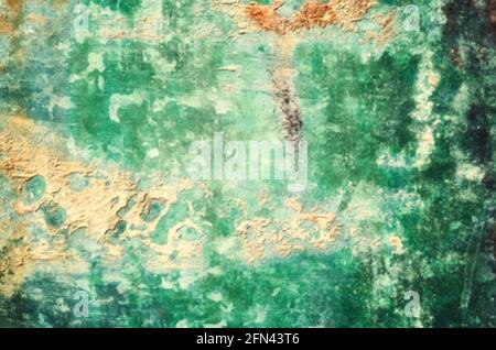 Blurred picture of an old dirty metal wall, abstract background or texture. Stock Photo