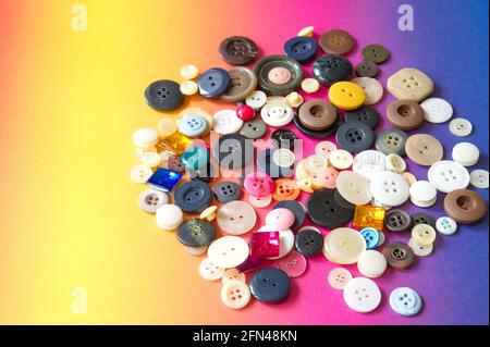 Flat lay of sewing buttons on colorful background Stock Photo