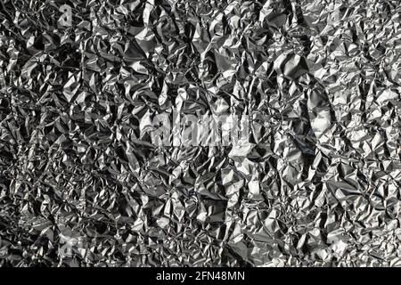 a background made with crumpled aluminum foil Stock Photo