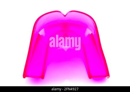 Giddaa Boil Bite Custom Fit Mouth Guard colorful mouth guard on white background Stock Photo