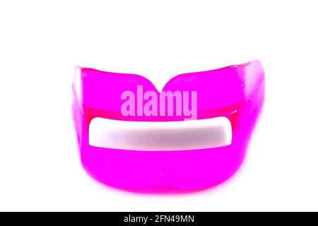 Giddaa Boil Bite Custom Fit Mouth Guard colorful mouth guard on white background Stock Photo